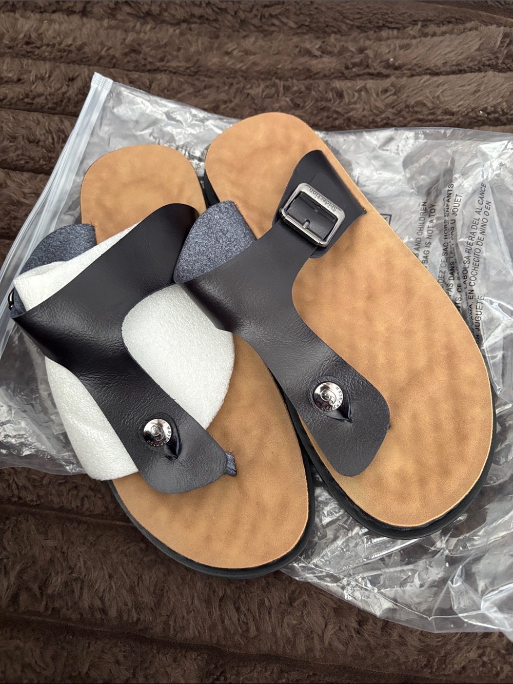 Black Leather Toe-Post Sandals with Tan Footbed